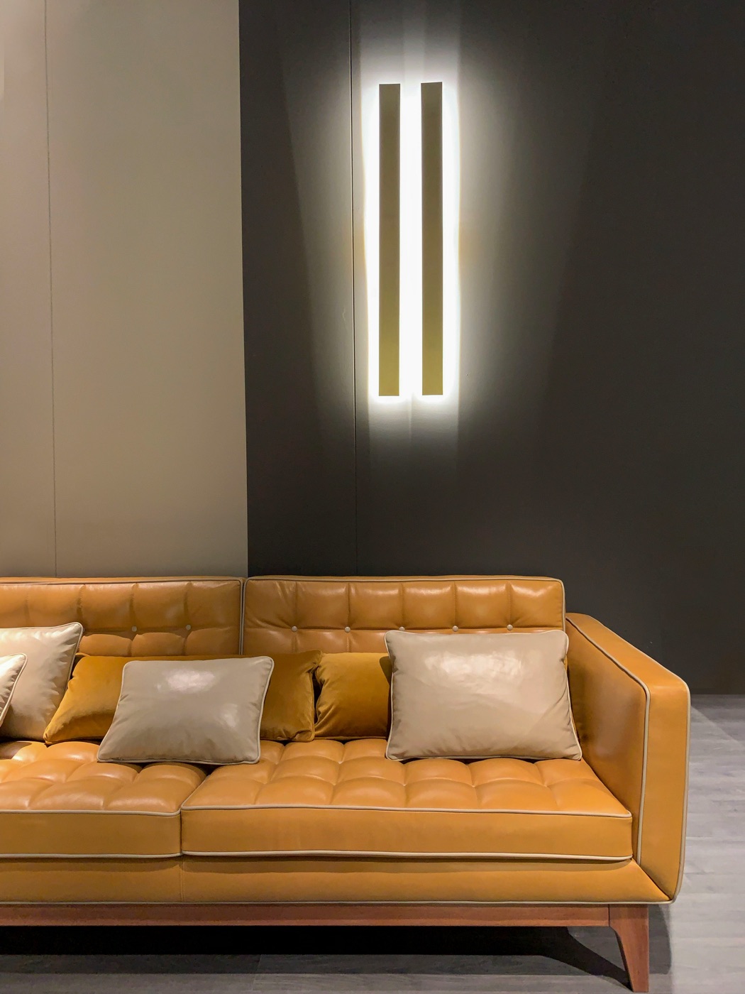 Tan leather sofa in a modern living space